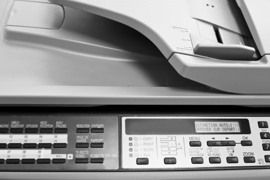 metal control panel of big copier close up